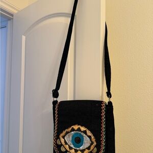 Black and Gold Women's Bag with Eye Design